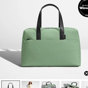 NWT fully paper wrapped handles and zipper pull. Away Everything Bag.